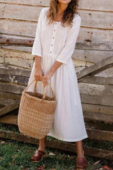 Vestido de media manga con botones y cuello redondo